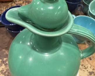 Vintage Fiesta Ware Green Carafe with Stopper – Classic collectible mid-century pottery.