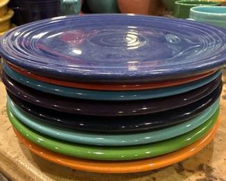 Fiesta Ware Plate Stack – Assorted colors including cobalt, turquoise, green, and orange, classic collectible dinnerware set.