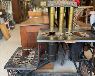 Jewel No. 854 cast-iron gas stove with brass boiler attachment, manufactured by G.M. Clark & Co., Chicago