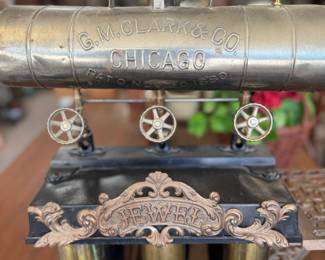 Jewel No. 854 cast-iron gas stove with brass boiler attachment, manufactured by G.M. Clark & Co., Chicago