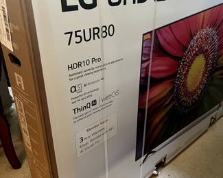 75" flatscreen TV still in its box