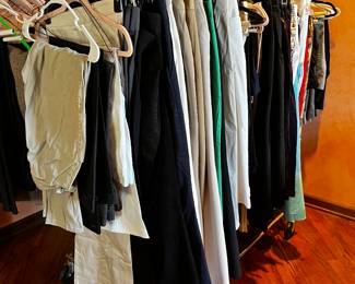 Other side of a double rack of women's pants and slacks