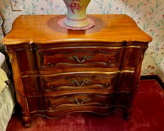This is one of a pair of large end tables/commodes made by The Continental Furniture Company in High Point, NC. They specialized in high quality, solid wood furniture and was founded in 1901, closing its doors in the 1950s. You can't find this quality anymore. These measure 39" wide x 21.5" deep and 21.5" high.