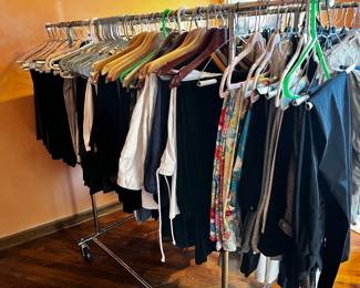One side of a double rack of women's pants and slacks