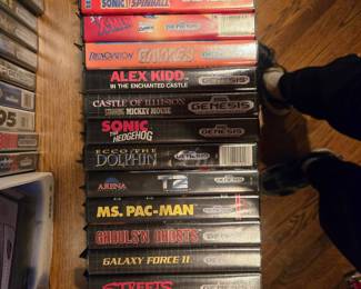 Sega Genesis Games: Out Runners, Aladdin, World Series Baseball, Sonic Spinball, X-Men,  Sega Saturn NIB,  Alex Kidd in the Enchanted Castle, Castle of Illusion, Sonic the Hedgehog, Ecco The Dolphin, T2, Ms. Pac-Man, Ghouls'n Ghosts, Galaxy Force II, Streets of Rage, Altered Beast, Super Hang On, Road Rash
