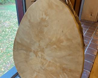 Native American-style hand drum made with animal hide.