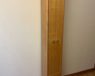 Tall storage cabinet (approx. 6’, 4” in height).