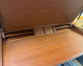 Herman Miller Newhouse Group stand-up executive table with top raised.