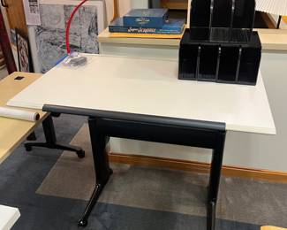 Herman Miller height-adjustable desk or table.