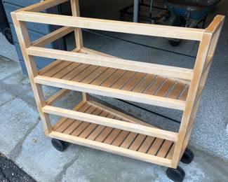 Custom-made wood rolling cart.