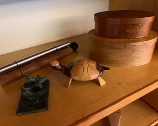 Two oval Shaker pantry boxes, including #2 birdseye maple by Jim Berta (bottom), and another by Pine Woodworking (top); and a Woodstock single chime by J.W. Stannard.