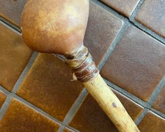 Deer hide drum gourd rattle.