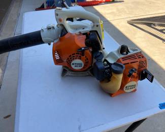 Stihl blower and trimmer. Trimmer currently has blade mounted, string head is included. Trimmer also has safety removed, on/off switch is deactivated, to stop trimmer activate the choke.