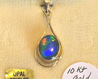 Australian opal triplets in 10k gold pendant.