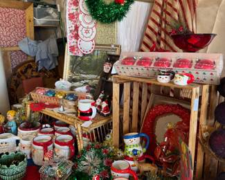 Christmas wreaths, ornament boxes, Santa mugs, snowman mugs, candles, colored glassware, figurines, angels, carolers, etc.