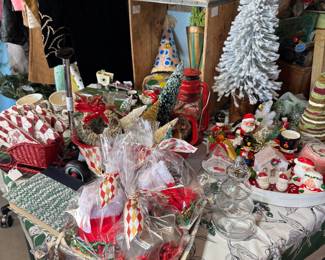 Putz house, vintage Christmas candles, linens, ornaments, red lantern, new years eve party hats, flocked tree, etc.