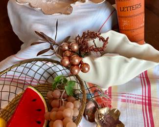 Brass basket, bowl filler fruit, mid-century glassware, postcards, planter. tablecloths