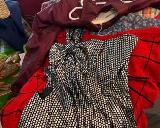 Piles of vintage clothes.