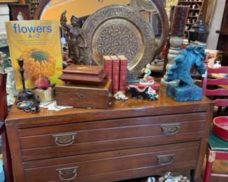Antique solid wood vanity with oval swivel mirror and drawers, decorative items
