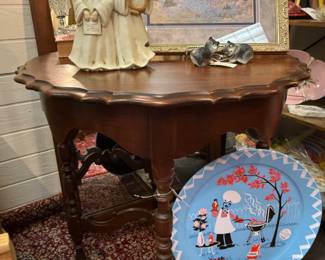 Antique pie crust table, metal serving tray, nun music box, bluebonnet and church framed print