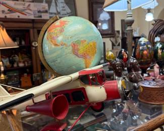 globe, vintage metal airplane and other collectibles