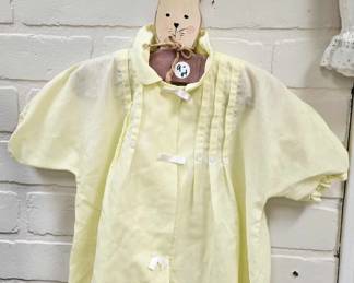 vintage child's clothes and hanger