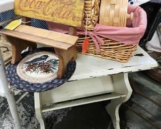 vintage magazine table. coca cola bench, vintage baskets