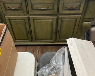 Green kitchen island with custom granite top