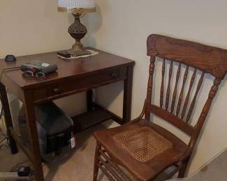 Oak cane seat chair; library table