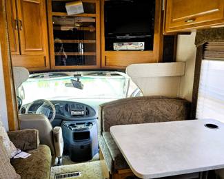 BID on this pristine motorhome. Come to the sale to see this motorhome and place bid at register. Just like the home this couple kept, immaculate. Photo of the details of this motorhome is in this listing. Please read the photo details for all the information on this 2004 Motorhome with 2 slide outs with 50K miles. Runs like a charm. So well taken care of. Sleeps 6 people. Dining turns into a bed and sofa turns into a bed and there is a slide out master bedroom. Bathroom with toilet and sink and then a separate shower. Plus the Burr Lift supports up to 4000 lbs!