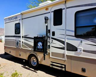 BID on this pristine motorhome. Come to the sale to see this motorhome and place bid at register. Just like the home this couple kept, immaculate. Photo of the details of this motorhome is in this listing. Please read the photo details for all the information on this 2004 Motorhome with 2 slide outs with 50K miles. Runs like a charm. So well taken care of. Sleeps 6 people. Dining turns into a bed and sofa turns into a bed and there is a slide out master bedroom. Bathroom with toilet and sink and then a separate shower. Plus the Burr Lift supports up to 4000 lbs!
