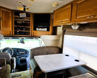BID on this pristine motorhome. Come to the sale to see this motorhome and place bid at register. Just like the home this couple kept, immaculate. Photo of the details of this motorhome is in this listing. Please read the photo details for all the information on this 2004 Motorhome with 2 slide outs with 50K miles. Runs like a charm. So well taken care of. Sleeps 6 people. Dining turns into a bed and sofa turns into a bed and there is a slide out master bedroom. Bathroom with toilet and sink and then a separate shower. Plus the Burr Lift supports up to 4000 lbs!