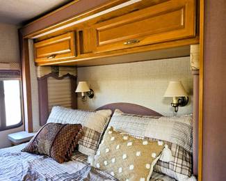 BID on this pristine motorhome. Come to the sale to see this motorhome and place bid at register. Just like the home this couple kept, immaculate. Photo of the details of this motorhome is in this listing. Please read the photo details for all the information on this 2004 Motorhome with 2 slide outs with 50K miles. Runs like a charm. So well taken care of. Sleeps 6 people. Dining turns into a bed and sofa turns into a bed and there is a slide out master bedroom. Bathroom with toilet and sink and then a separate shower. Plus the Burr Lift supports up to 4000 lbs!