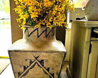 Fake yellow flowers with pot