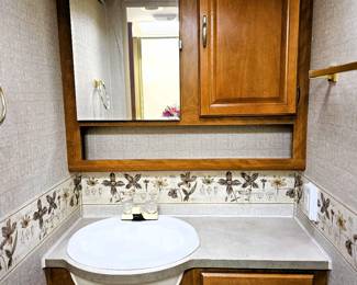 BID on this pristine motorhome. Come to the sale to see this motorhome and place bid at register. Just like the home this couple kept, immaculate. Photo of the details of this motorhome is in this listing. Please read the photo details for all the information on this 2004 Motorhome with 2 slide outs with 50K miles. Runs like a charm. So well taken care of. Sleeps 6 people. Dining turns into a bed and sofa turns into a bed and there is a slide out master bedroom. Bathroom with toilet and sink and then a separate shower. Plus the Burr Lift supports up to 4000 lbs!