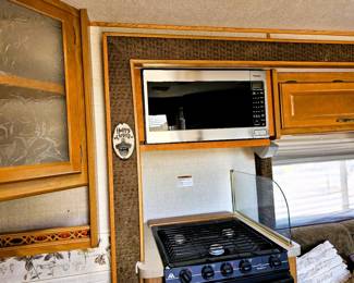 BID on this pristine motorhome. Come to the sale to see this motorhome and place bid at register. Just like the home this couple kept, immaculate. Photo of the details of this motorhome is in this listing. Please read the photo details for all the information on this 2004 Motorhome with 2 slide outs with 50K miles. Runs like a charm. So well taken care of. Sleeps 6 people. Dining turns into a bed and sofa turns into a bed and there is a slide out master bedroom. Bathroom with toilet and sink and then a separate shower. Plus the Burr Lift supports up to 4000 lbs!