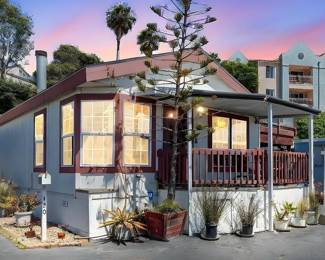 Beautiful Home for sale; reduced $97,000; walk to the beach in Oceanside, CA, near San Diego, La Jolla, Carlsbad & all the great places. Walk to shops and restaurants. Best weather in the world! Rooftop deck - panoramic view with view of the ocean and night skies.  55 and older. Year round home, vacation or investment you can rent. One of the only parks along the California coast where you can rent your home. Only $397,000!!! CALL 480-577-8396 OR TEXT