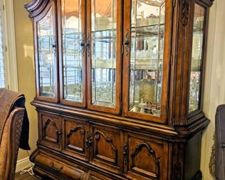 Matching the dining set, lighted display cabinet with underneath storage plus drawers.