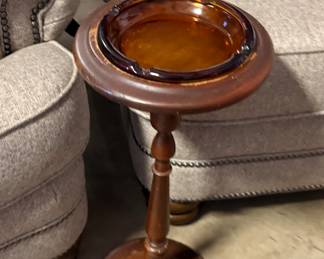 Vintage amber ashtray in wooden stand
