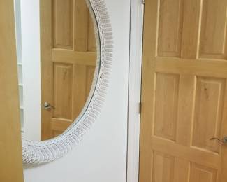 Round wicker wall mirror
