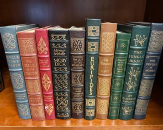 Several leather bound books.