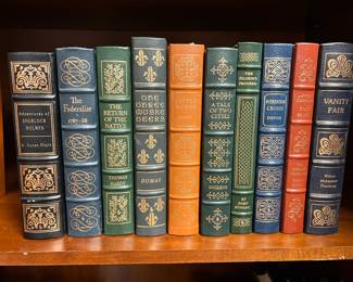 Several leather bound books.