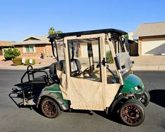 Golf Cart for sale. Come in and place a bid at the register. New 2025 enclosure, flip folding back seat, gas powered, totally street legal, headlights, tail lights, blinkers, 2014 refurbished. Runs beautiful!