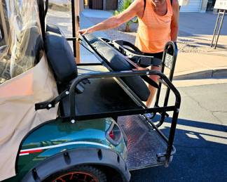 Golf Cart for sale. Come in and place a bid at the register. New 2025 enclosure, flip folding back seat, gas powered, totally street legal, headlights, tail lights, blinkers, 2014 refurbished. Runs beautiful!