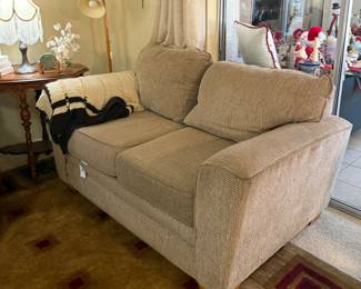 Tan loveseat sofa