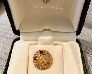 10 karat gold pin with blue sapphires