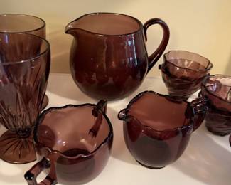 Amethyst dishes with serving pieces and tall vase