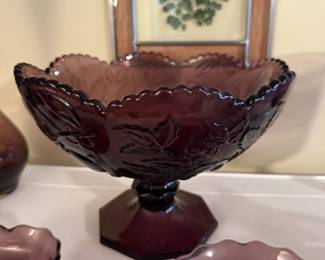 Amethyst dishes with serving pieces and tall vase