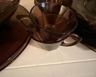 Amethyst dishes with serving pieces and tall vase