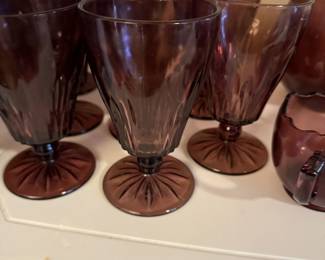 Amethyst dishes with serving pieces and tall vase